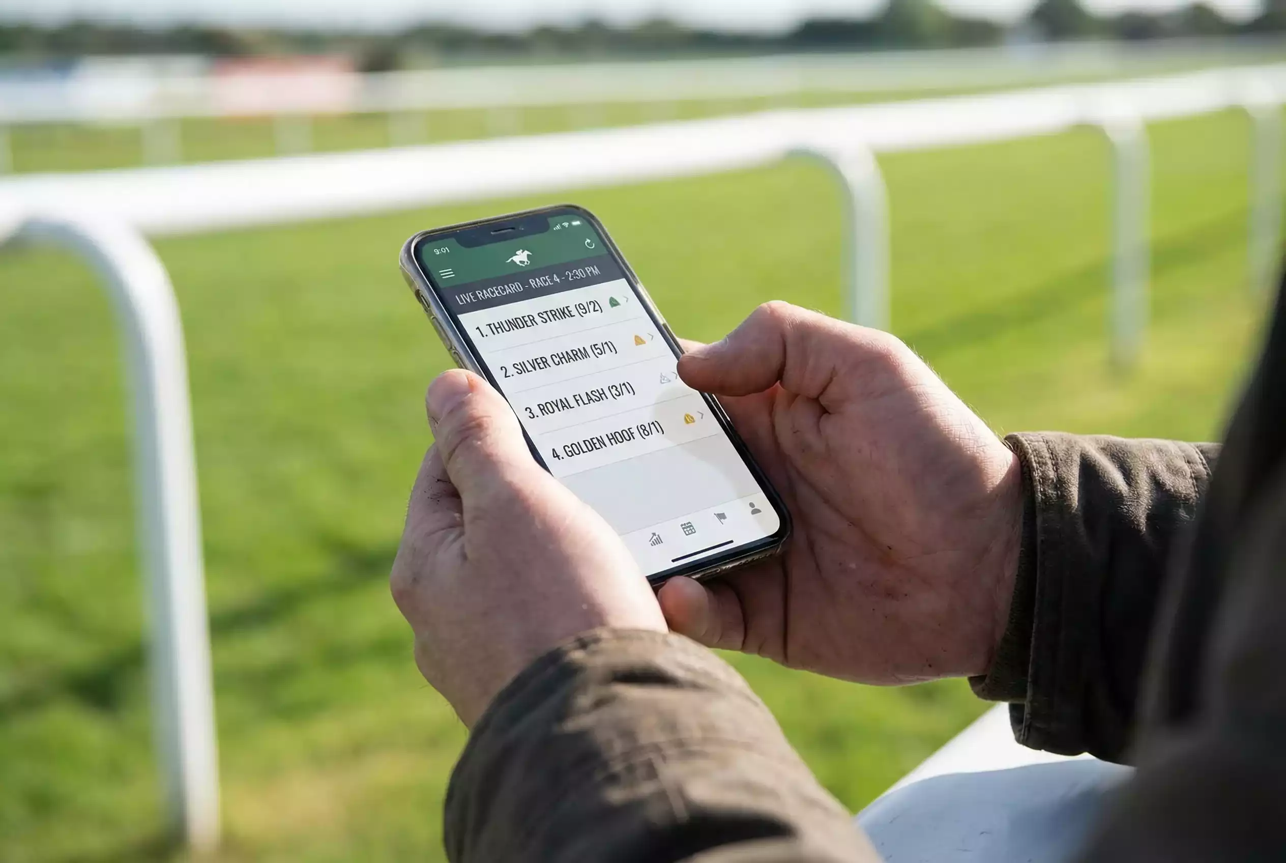 Smartphone displaying horse racing app with live racecard and non runner alerts